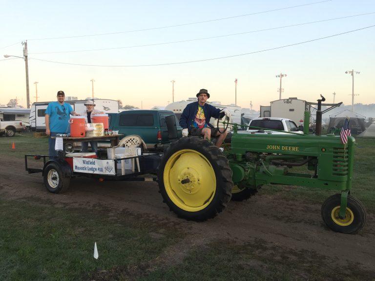 Winfield Masonic Lodge selling donuts and coffee on a tractor and trailer